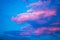 Celestial World concept. Dark purple blue pink natural bright sunset sky cumulus clouds. Background natural color of