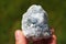 Celestine or Celestite crystal from Madagascar held in a hand