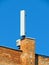 Cell phone antenna, transmitter. Telecom radio mobile antenna against blue sky