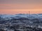 Cell towers in the snow-covered hills in tundra. Beautiful sunset hilly landscape of the Arctic