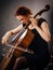 Cello player concentrating on her playing