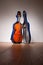 A cello standing in a blue hard case