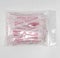 A cellophane packet of pink woven id name tapes