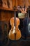 Cellos standing in luthier workshop