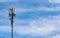 Cellular network antenna against blue sky