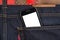 Cellular phone in jeans pocket