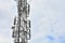 Cellular tower with antennas for connecting people by means of telephony and internet. Telecommunication equipment on tower.Close-