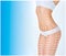 The cellulite removal plan. White markings on young woman body