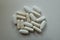 Cellulose white capsules of magnesium citrate and caplets of calcium citrate