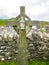 Celtic Cross with Infant Jesus of Prague at the Church of Saint Dympna`s, an 18th century Church, Achill Mayo Ireland