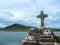 Celtic Cross over looking Mountain and Water