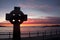Celtic cross at sunset