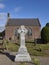 The Celtic Cross War Memorial situated within the Graveyard of Stracathro Parish Church in Angus.