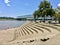 Cement amphitheater next to a large river