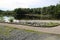 A cement boat launch leading into the calm water