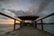 Cement bridge Jetty Batu Musang during sunset.