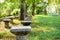 Cement chair in a park,green nature playground,