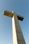 Cement cross located at the top of the natural area of the desert of las palmas