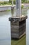 Cement post on canal in country Thailand