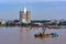 Cement silos on the bank of the river