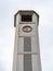 Cement Tower with a Clock at the Top