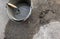 Cement trowel in bucket