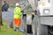 Cement Truck Driver Adjusts Chute