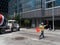 Cement truck exiting construction site with flagger