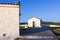 The cemetery of Agios Efstratios island, overlooking the harbor, in warm sunset colors