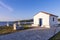 The cemetery of Agios Efstratios island, overlooking the harbor, in warm sunset colors