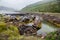 Cemetery of fishing boats in water of the Barents Sea, Teriberka, Russia.