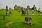 The cemetery in the medieval monastery of Clonmacnoise, Ireland, during a rainy summer day