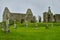 The cemetery in the medieval monastery of Clonmacnoise, Ireland, during a rainy summer day