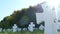 Cemetery with white crosses on a sunny day.