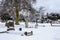 Cemetery winter cityscape with snow