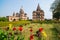 Cenotaphs at Orchha, Madhya Pradesh. Also spelled Orcha, famous travel destination in India. Moghul gardens, blue sky.