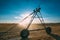 Center pivot irrigation system with drop sprinklers in field