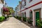 Center of puerto de mogan with lots of bougainvillea flowers, Canary Island