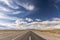 Centered road middle POV in a salt field. Salinas Grandes, Jujuy, Argentina. Symmetrical landscape photography.