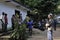 CENTRAL AFRICA JUNGLE, CONGO, AFRICA - OCTOBER 30, 2008: Beautiful girl with Group of tourists in Bomass\'s camp on the Sangha rive