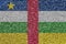 Central African Republic flag depicted on many small shiny sequins. Colorful festival background for party