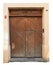 The central front wooden door to the old public medieval  church 