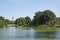 Central Park pond view and bow bridge in New York