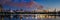 Central Park Reservoir and Midtown skyscrapers illuminated at twilight. New York City