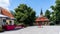 The central square of the city of Sigtuna. Old wooden church built at the past centuries. Landmarks of the ancient capital of