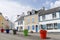 Central square of a typical brittany village with giant colored flower pots with nobody, Locmaria at Belle Ile en mer, Morbihan,