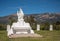 Central white statue of Jesus, Calvary Cemetery. Santa Barbara, CA, USA