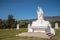 Central white statue of Jesus, Calvary Cemetery. Santa Barbara, CA, USA