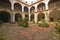 Centuries-old arches and courtyard of Hotel Florida, a colonial building in Havana, Cuba