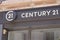 Century 21 sign round text and brand logo onn facade real estate agency broker office